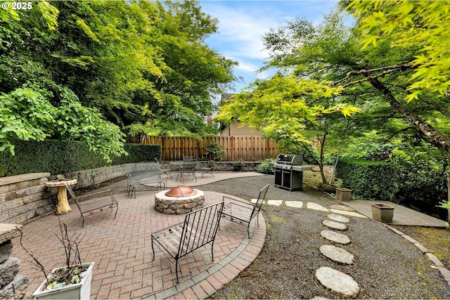 3420 SE 144th Ct, Vancouver, WA 98683 - view of patio with a fire pit and grilling area