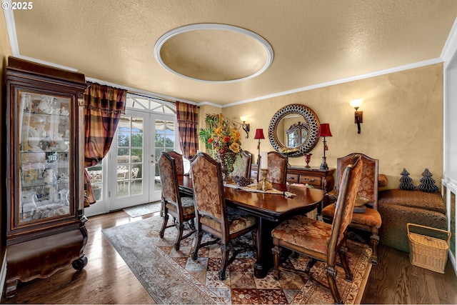 3420 SE 144th Ct, Vancouver, WA 98683 - dining area featuring crown molding, wood finished floors, and a textured ceiling