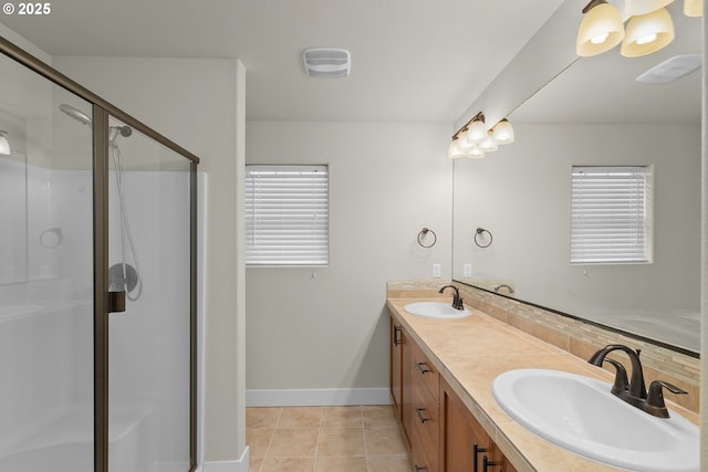 bathroom with vanity, tile patterned floors, and an enclosed shower