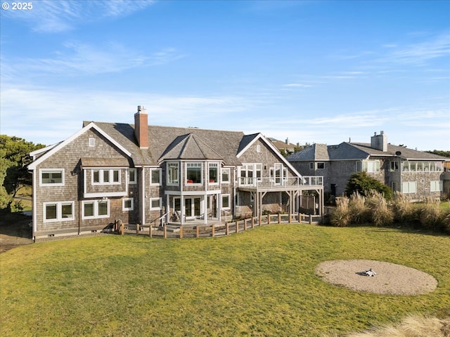 4650 S Fairway Dr, Gearhart, OR 97138 - rear view of house with a chimney, a yard, a patio area, and a balcony