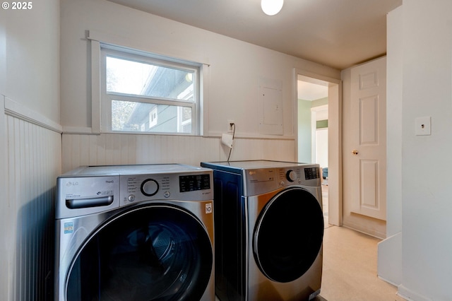 laundry room featuring washing machine and clothes dryer