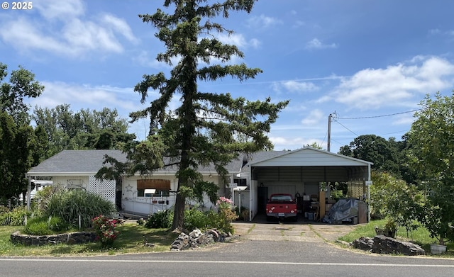 35001 Seavey Loop Rd, Eugene, OR 97405 - view of front of house with a detached carport and driveway