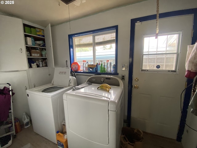 35001 Seavey Loop Rd, Eugene, OR 97405 - laundry area featuring washer and clothes dryer and plenty of natural light