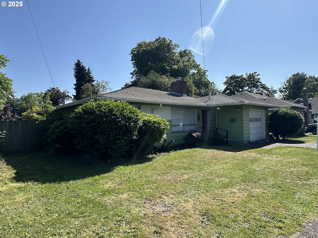 3032 NW Grant Ave, Corvallis, OR 97330 - back of property with an attached garage and a chimney