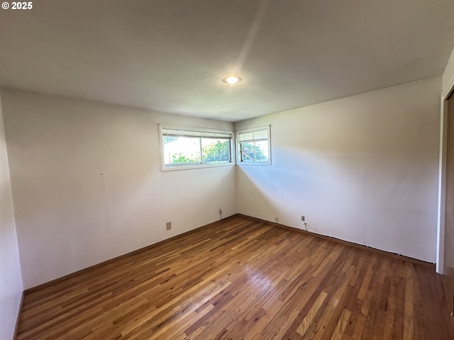 3032 NW Grant Ave, Corvallis, OR 97330 - empty room featuring wood finished floors and recessed lighting