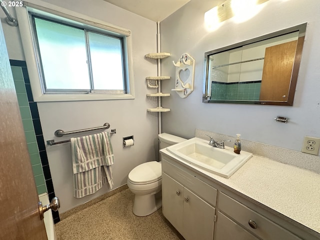3032 NW Grant Ave, Corvallis, OR 97330 - bathroom with a shower, vanity, and speckle patterned floor