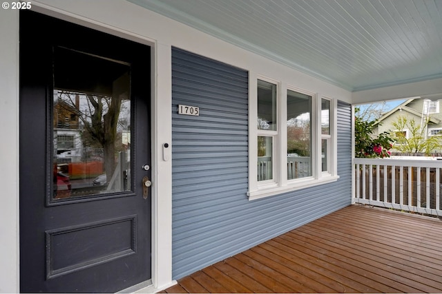 doorway to property featuring a porch