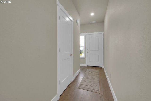 3783 Rockcress Rd, Eugene, OR 97403 - doorway to outside featuring wood finished floors, baseboards, and recessed lighting