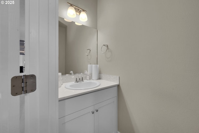 3783 Rockcress Rd, Eugene, OR 97403 - bathroom featuring vanity and tasteful backsplash
