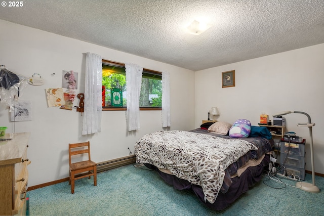bedroom featuring carpet flooring, a baseboard radiator, and a textured ceiling