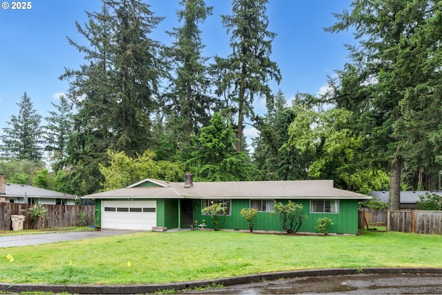 ranch-style house with an attached garage, driveway, and board and batten siding