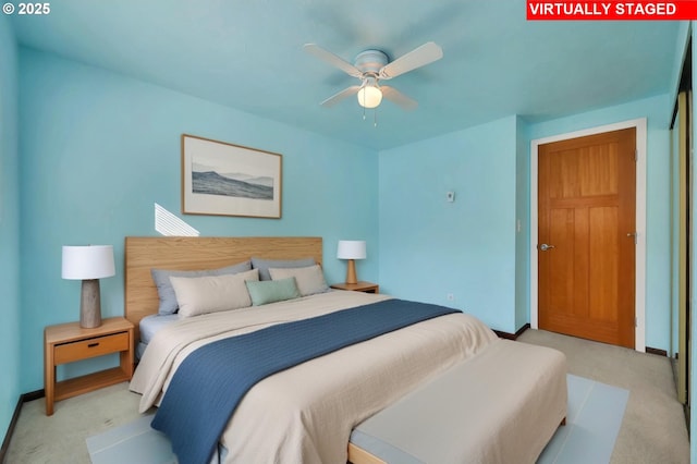 bedroom featuring carpet, baseboards, and ceiling fan