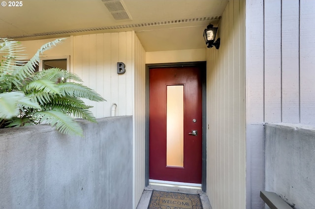 entrance to property featuring visible vents