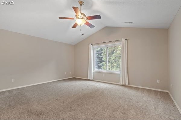 17504 SE 16th Cir, Vancouver, WA 98683 - carpeted empty room featuring vaulted ceiling, ceiling fan, and baseboards