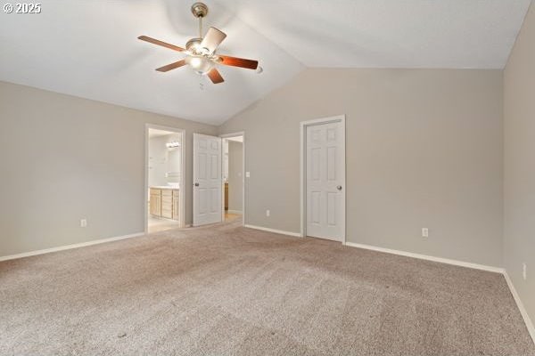 17504 SE 16th Cir, Vancouver, WA 98683 - unfurnished bedroom featuring carpet flooring, lofted ceiling, baseboards, ensuite bathroom, and a ceiling fan