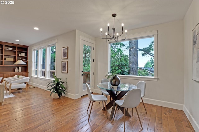 1734 NW Saltzman Rd, Portland, OR 97229 - dining space with plenty of natural light, baseboards, a chandelier, light wood finished floors, and recessed lighting