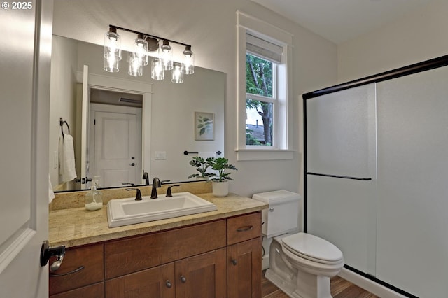 1734 NW Saltzman Rd, Portland, OR 97229 - full bath with toilet, vanity, wood finished floors, an enclosed shower, and baseboard heating