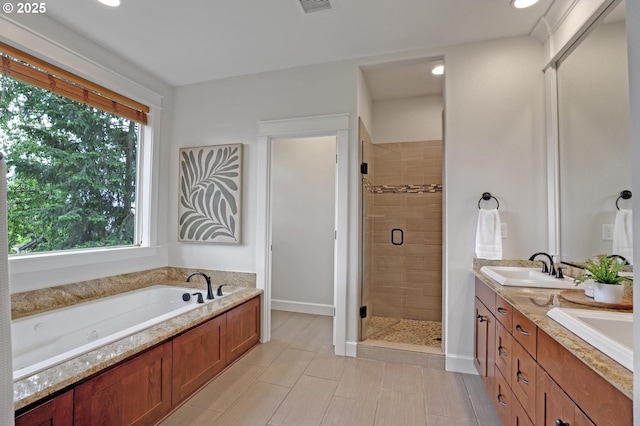 1734 NW Saltzman Rd, Portland, OR 97229 - bathroom featuring a stall shower, a garden tub, recessed lighting, double vanity, and baseboards