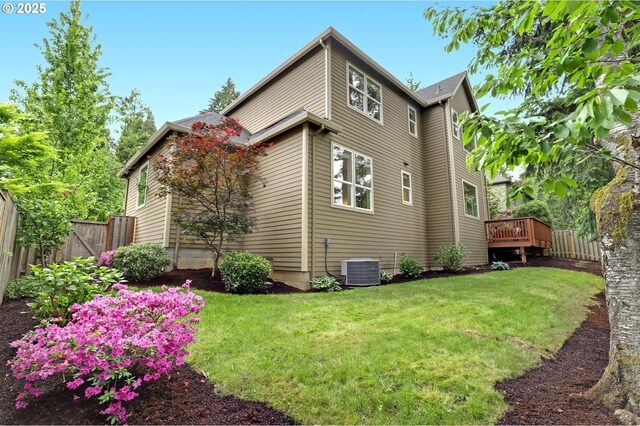 1734 NW Saltzman Rd, Portland, OR 97229 - rear view of house with cooling unit and a wooden deck