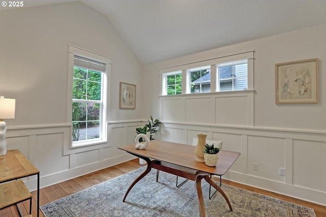 1734 NW Saltzman Rd, Portland, OR 97229 - home office with a decorative wall, wood finished floors, vaulted ceiling, and wainscoting