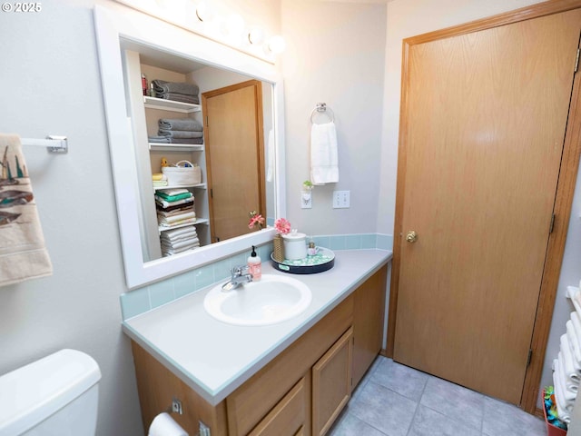 3135 SE 26th St, Gresham, OR 97080 - bathroom with vanity, a closet, and tile patterned flooring