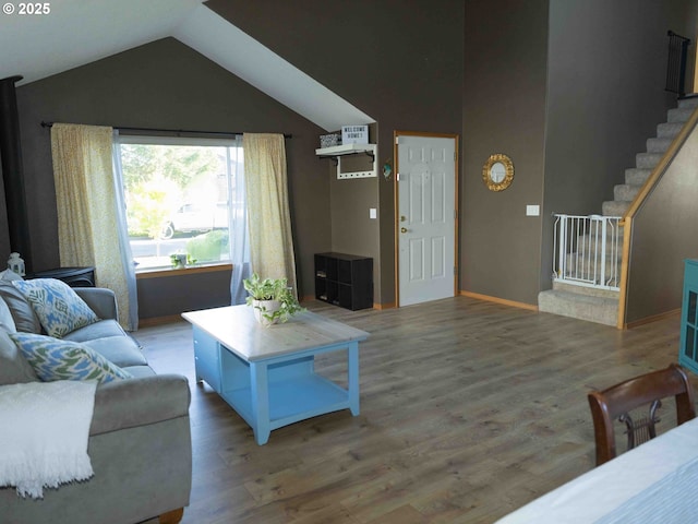 3135 SE 26th St, Gresham, OR 97080 - living area with vaulted ceiling, wood finished floors, and stairway