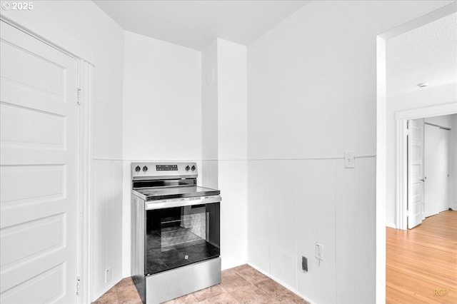 kitchen featuring stainless steel electric range oven