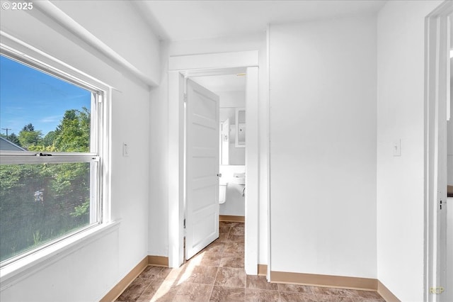 unfurnished bedroom with baseboards
