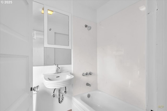 bathroom with shower / bath combination