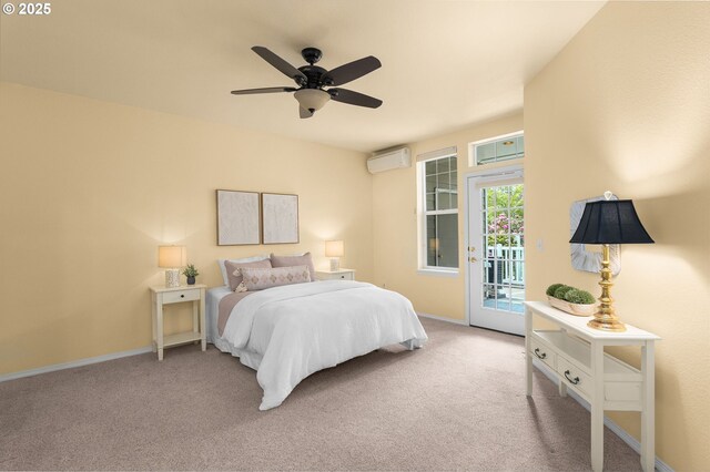 1231 NE Horizon Loop Unit 203, Hillsboro, OR 97124 - bedroom with a wall mounted AC, access to exterior, carpet flooring, and baseboards