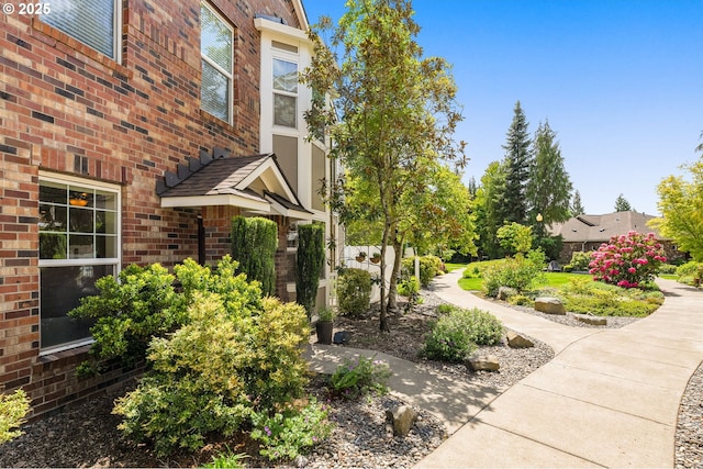 1231 NE Horizon Loop Unit 203, Hillsboro, OR 97124 - view of property exterior featuring brick siding
