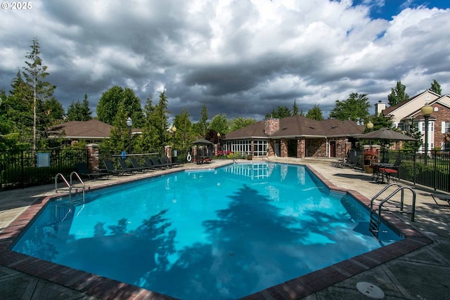 1231 NE Horizon Loop Unit 203, Hillsboro, OR 97124 - community pool featuring a patio area