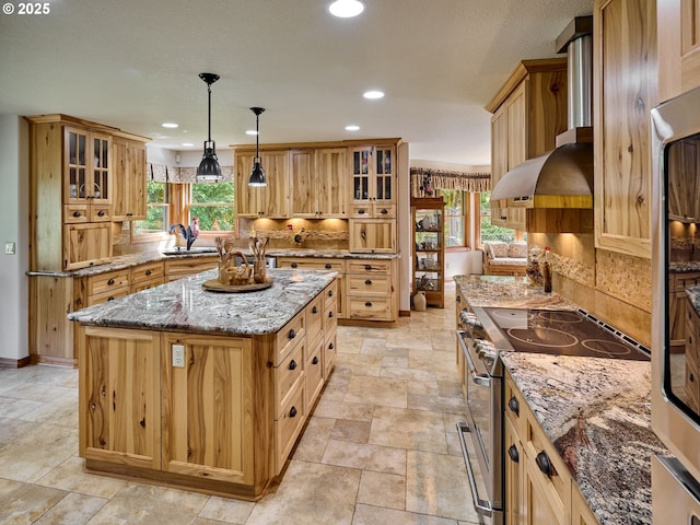 23456 S Schieffer Rd, Colton, OR 97017 - kitchen with stainless steel range with electric cooktop, a center island, backsplash, glass insert cabinets, and recessed lighting