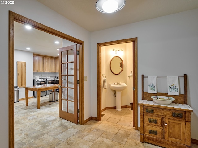 23456 S Schieffer Rd, Colton, OR 97017 - hall with baseboards, recessed lighting, and a sink