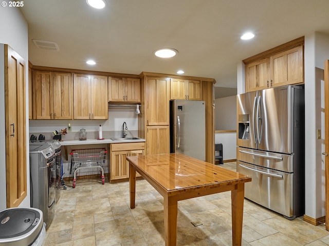23456 S Schieffer Rd, Colton, OR 97017 - kitchen with stainless steel fridge, separate washer and dryer, freestanding refrigerator, recessed lighting, and light countertops