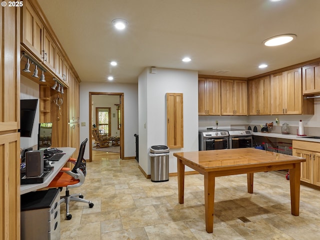 23456 S Schieffer Rd, Colton, OR 97017 - kitchen with washer and clothes dryer, baseboards, an office area, recessed lighting, and light countertops