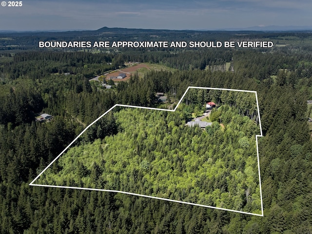 23456 S Schieffer Rd, Colton, OR 97017 - aerial view of property and surrounding area with a heavily wooded area and property boundaries highlighted