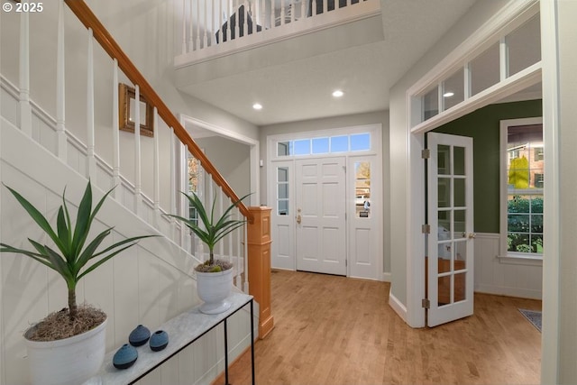 entrance foyer with light wood-type flooring