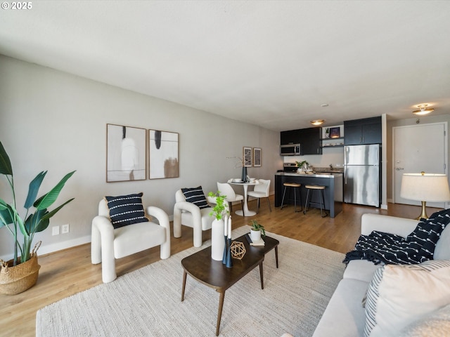 255 SW Harrison St Unit 9C, Portland, OR 97201 - living area with wood finished floors and baseboards