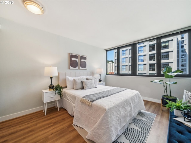 255 SW Harrison St Unit 9C, Portland, OR 97201 - bedroom with wood finished floors and baseboards