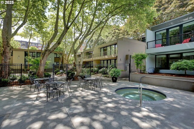 255 SW Harrison St Unit 9C, Portland, OR 97201 - view of swimming pool featuring a hot tub
