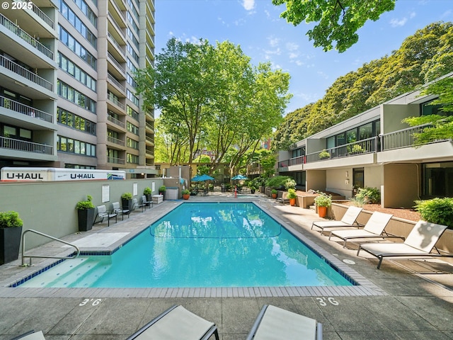 255 SW Harrison St Unit 9C, Portland, OR 97201 - community pool featuring a patio area