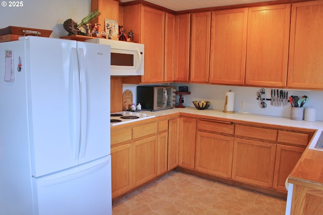 kitchen featuring white appliances