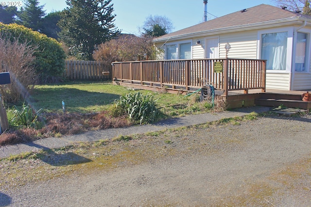 view of yard with a deck