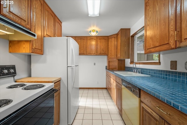 kitchen featuring dishwashing machine, sink, range with electric cooktop, ventilation hood, and tile countertops