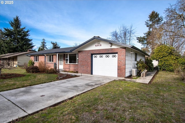 ranch-style home featuring central AC, a garage, and a front lawn