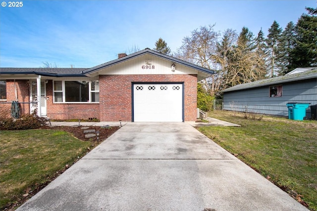 ranch-style home with a garage and a front lawn