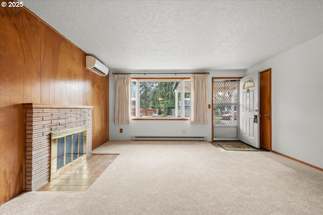 unfurnished living room featuring a baseboard radiator, a wall mounted air conditioner, and light colored carpet