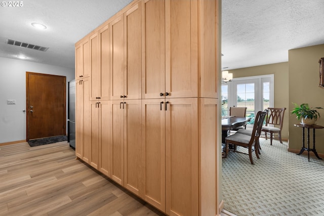 8747 S Heinz Rd, Canby, OR 97013 - corridor with a textured ceiling, a chandelier, light wood-style floors, and recessed lighting