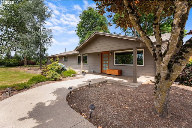 8747 S Heinz Rd, Canby, OR 97013 - view of front of house with a patio area